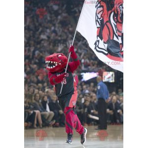 Rotes Dinosaurier-Maskottchen in der Sportbekleidung -