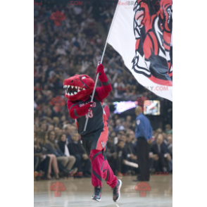 Mascote dinossauro vermelho em roupas esportivas -