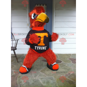 All hairy red and yellow bird mascot