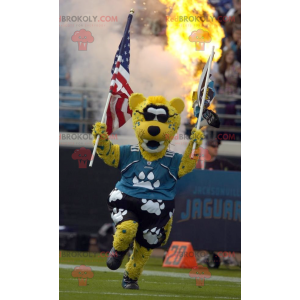 Mascotte de tigre jaune blanc et noir avec des lunettes de