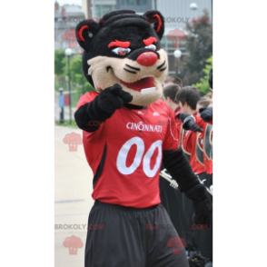 Mascote gato preto bege e vermelho - Redbrokoly.com