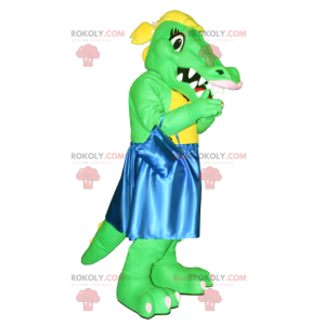 Grünes und gelbes Krokodilmaskottchen mit einem blauen Kleid -