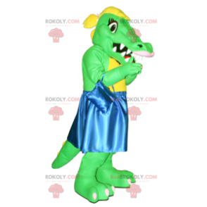 Mascote crocodilo verde e amarelo com vestido azul -