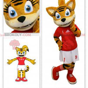 Mascotte de chat orange tigré en tenue de pom-pom girl -