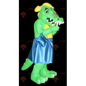 Mascota de cocodrilo verde y amarillo con un vestido azul -