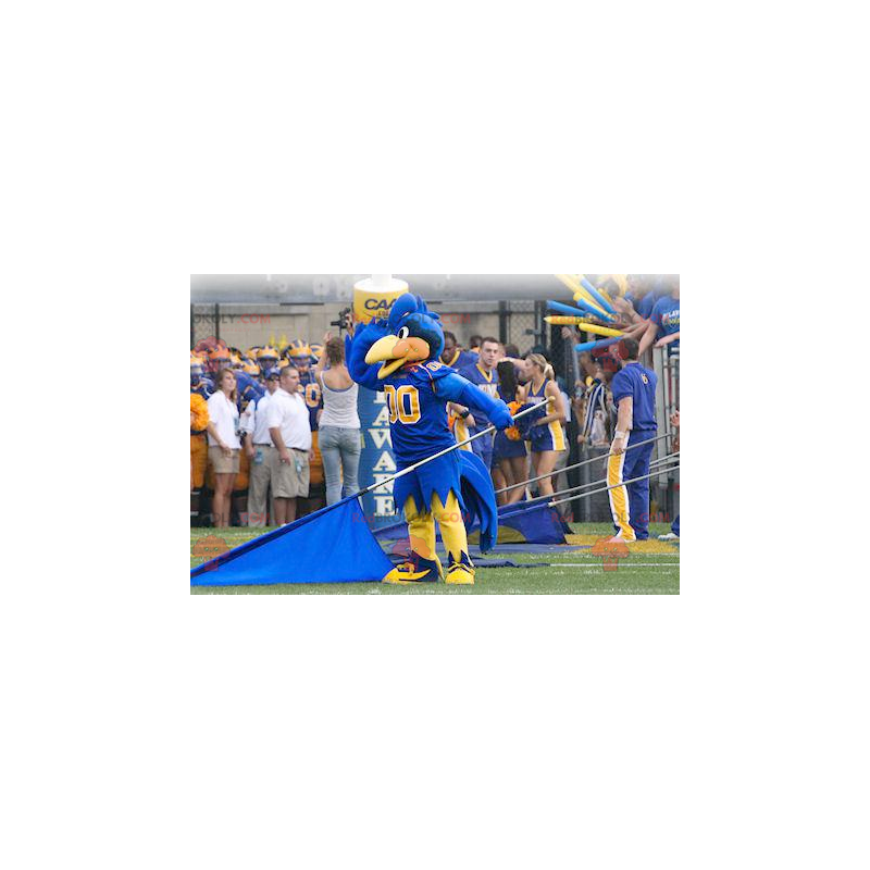 Mascota pájaro azul y amarillo en ropa deportiva -