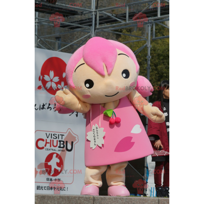 Girl mascot with hair and a pink dress - Redbrokoly.com