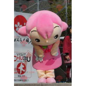 Mascote garota com cabelo e um vestido rosa - Redbrokoly.com
