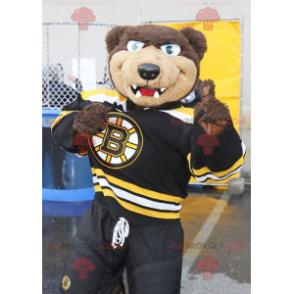 Mascotte d'ours marron à l'air féroce en tenue de sport -