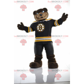 Mascotte d'ours marron à l'air féroce en tenue de sport -