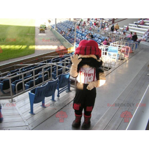 Mascotte d'homme moustachu avec un gros bonnet rouge -