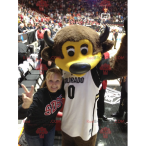 Brown and yellow bear mascot with horns and a jersey -