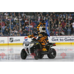 Black and white yellow tiger mascot dressed in a black costume