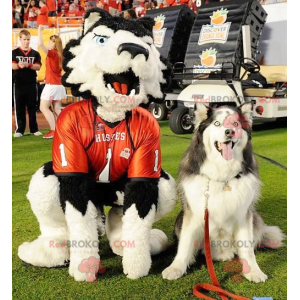 White and black dog mascot with blue eyes - Redbrokoly.com