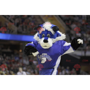Mascote raposa azul e branca em roupas esportivas -