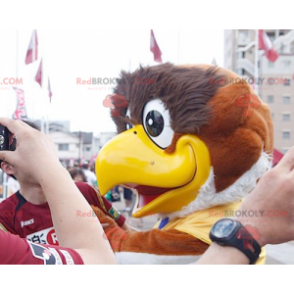 Gran pájaro mascota águila deportiva marrón y blanca -