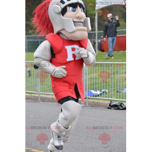 Knight mascot wearing red and gray armor - Redbrokoly.com