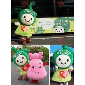 2 Maskottchen mit grünen und rosa Manga-Charakteren -