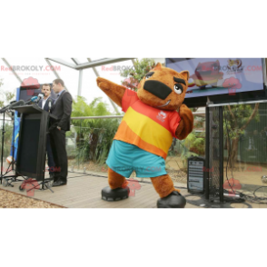 Mascotte orso marmotta marrone in abito colorato -