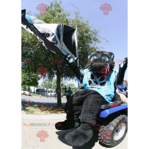 Mascota de la pantera negra con una camiseta azul -