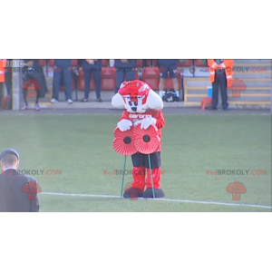 Mascota de gato blanco y rojo en ropa deportiva roja y negra -