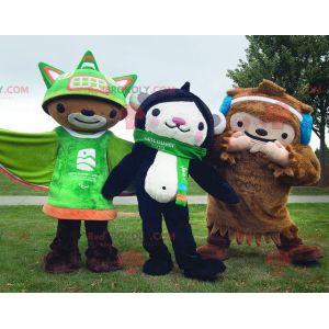 2 mascots a brown yeti and a black and white monkey -