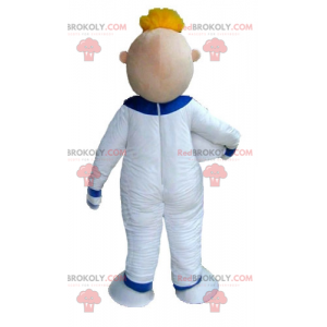 Mascota de astronauta de hombre rubio en mono blanco -
