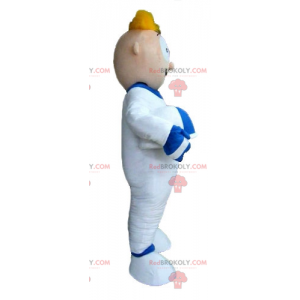 Blond mężczyzna astronauta maskotka w białym kombinezonie -