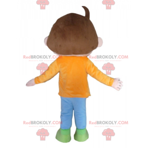 Brown boy mascot with an orange blue and green outfit -