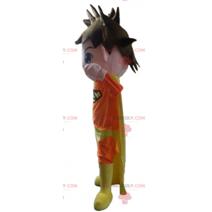 Mascotte supereroe vestita di arancione e giallo -