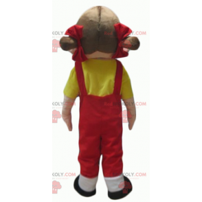 Mascot girl in red overalls with a yellow t-shirt -