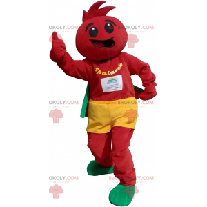 Mascote de boneco de neve todo vermelho com shorts amarelos -