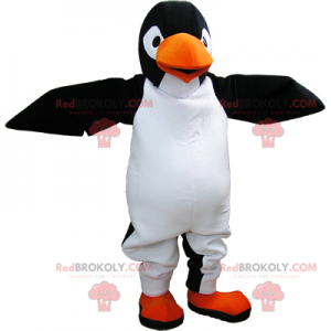 Mascote pinguin gigante preto e branco muito realista -