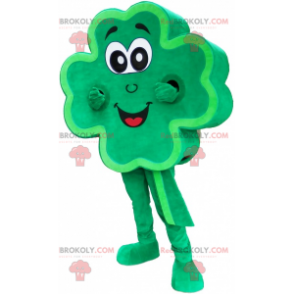 Grünes riesiges 4-Blatt-Klee-Maskottchen lächelnd -