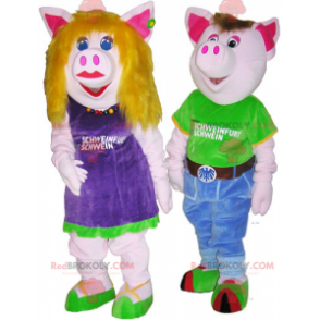 2 male and female pig mascots in colorful outfits -