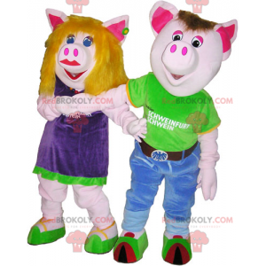 2 männliche und weibliche Schweinemaskottchen in bunten Outfits