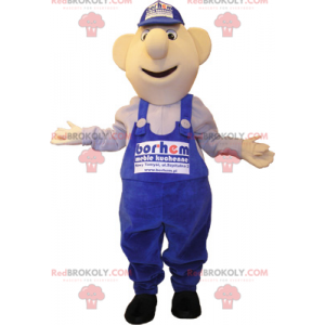 Mascotte de bonhomme en salopette et casquette bleues -