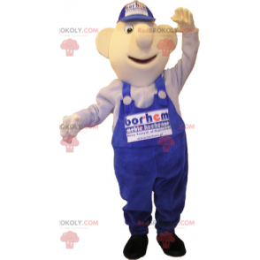 Mascotte de bonhomme en salopette et casquette bleues -