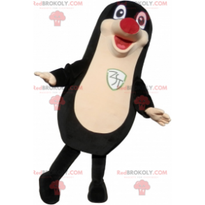 Mascotte de phoque noir dodu et drôle avec un nez rouge -