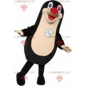 Mascotte foca nera grassoccia e divertente con un naso rosso -