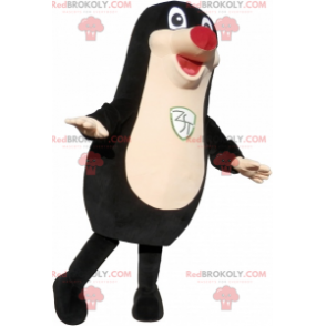 Mascotte foca nera grassoccia e divertente con un naso rosso -