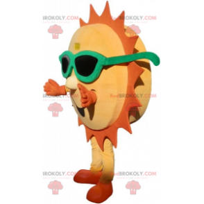 Mascotte de soleil jaune et orange avec des lunettes de soleil