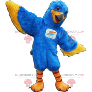 Mascota pájaro azul y amarillo. Mascota del águila -