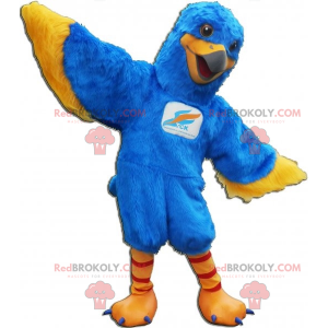 Mascote pássaro azul e amarelo. Mascote águia - Redbrokoly.com