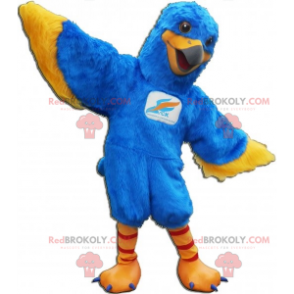 Blaues und gelbes Vogelmaskottchen. Adler Maskottchen -