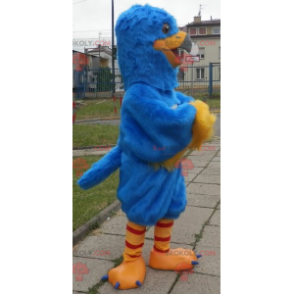 Blaues und gelbes Vogelmaskottchen. Adler Maskottchen -