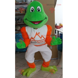 Maskot zelená žába oblečený v bílé a oranžové barvě -