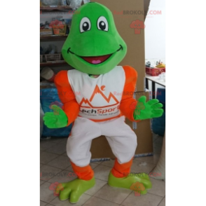 Green frog mascot dressed in white and orange - Redbrokoly.com