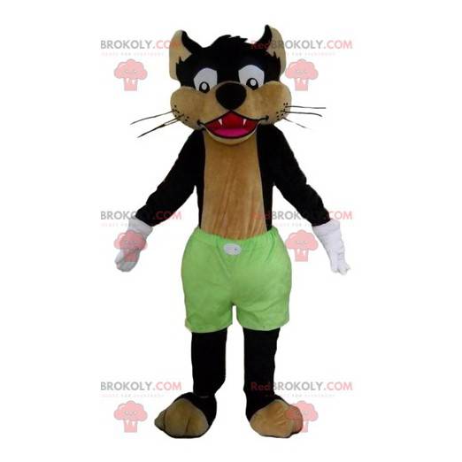 Czarno-brązowy wilk kot maskotka z zielonymi spodenkami -