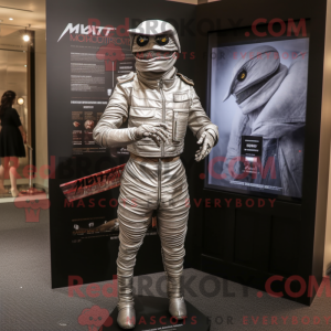 Silver Mummy mascot costume...